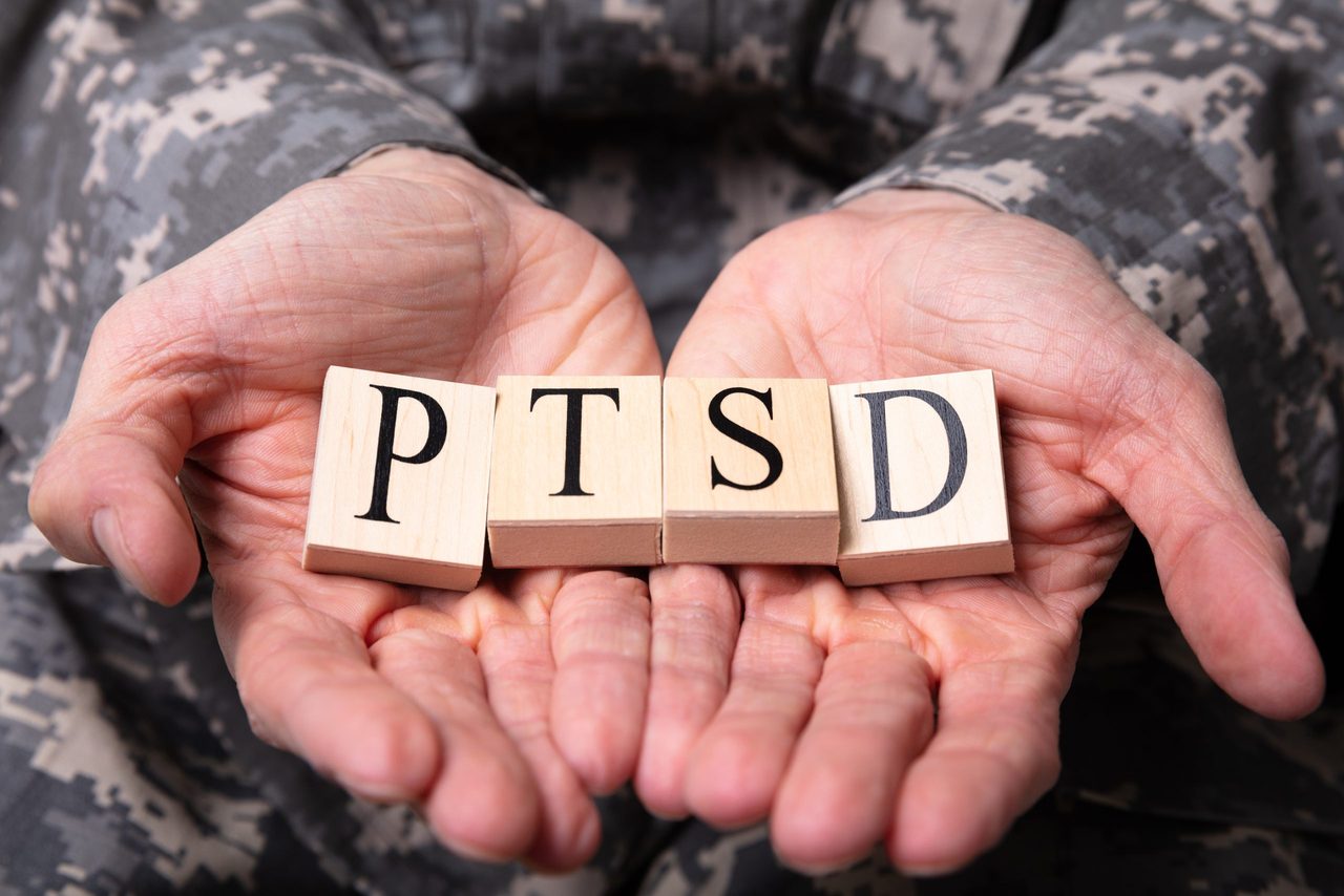A service member seated in a supportive counselling session